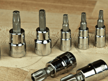 Crescent bit sockets sitting on top of a work table